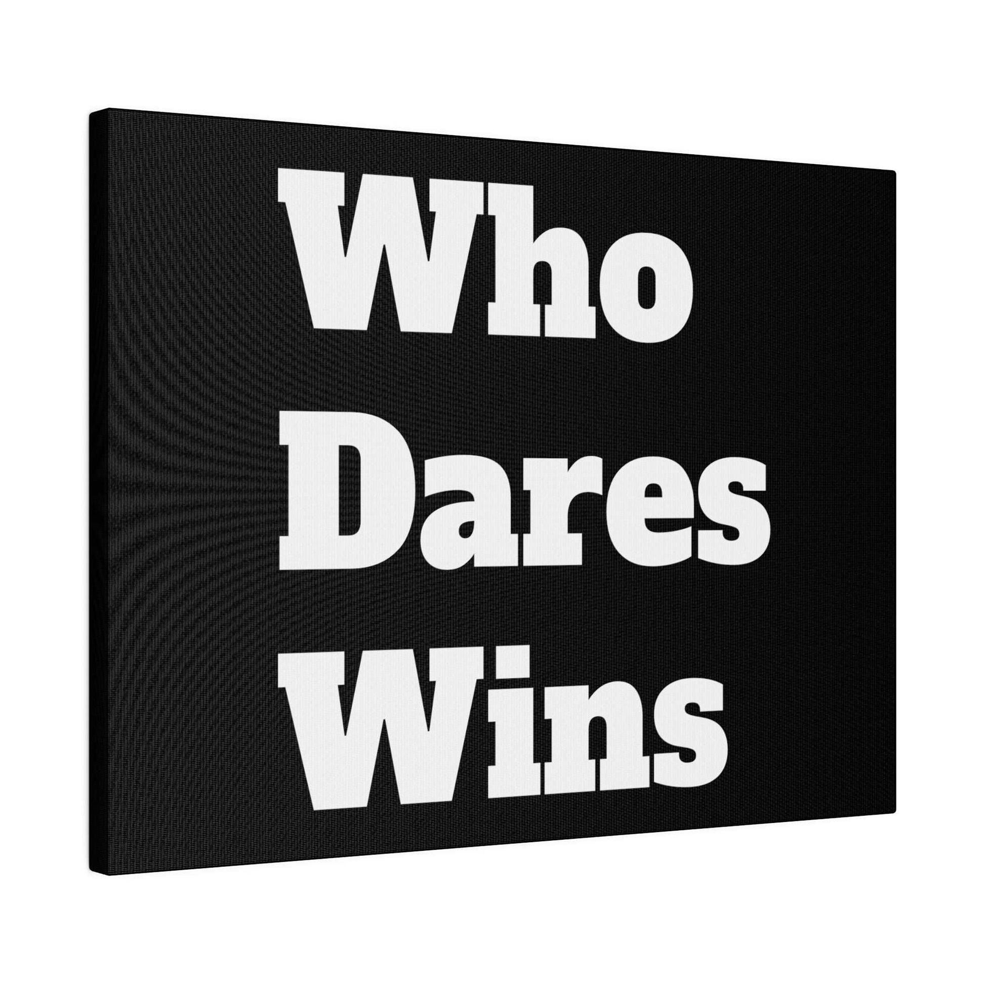Black canvas wall art with large white text reading Who Dares Wins, angled to the left.