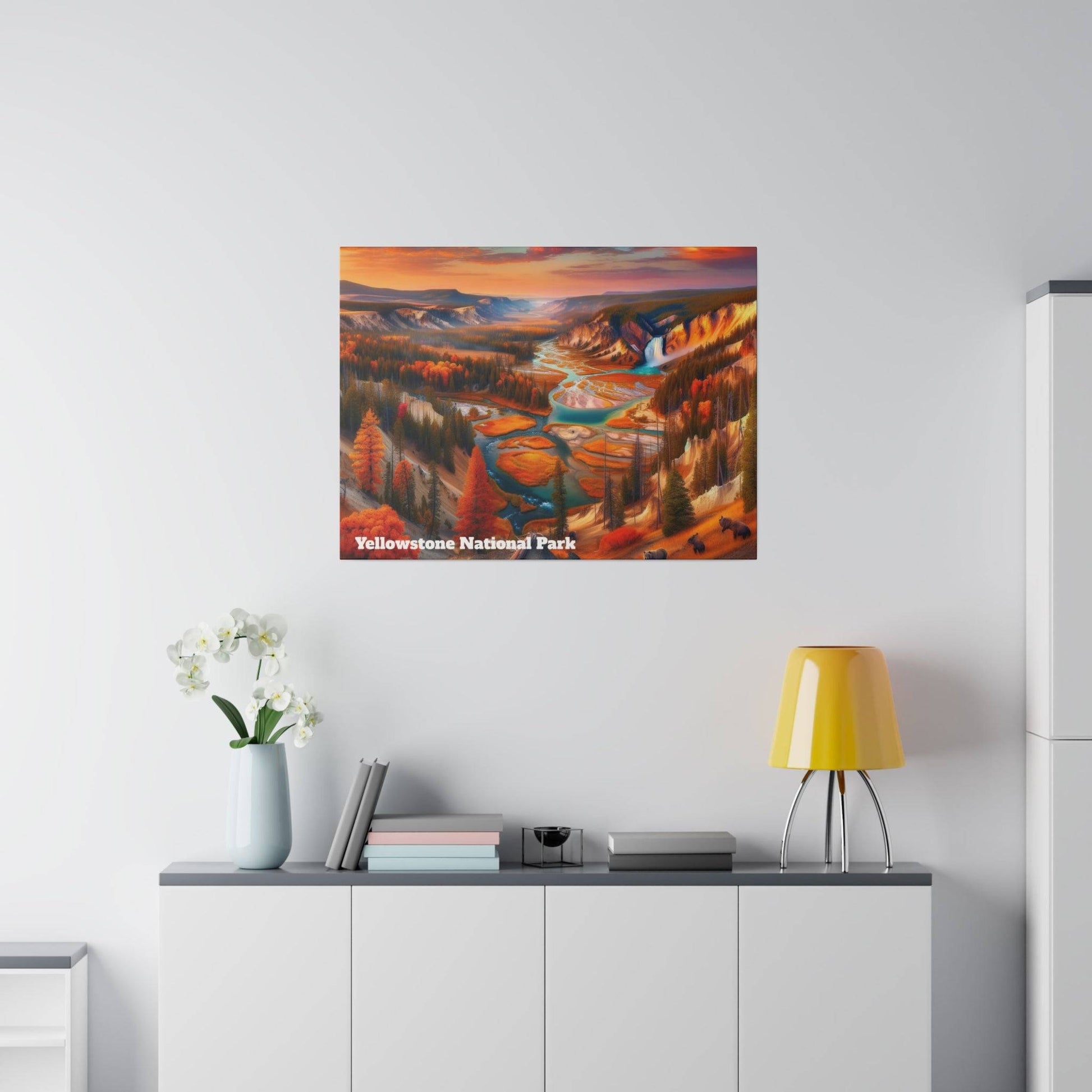 Poster depicting a colorful Yellowstone National Park landscape with rivers and autumn trees, mounted on a light gray wall above a white